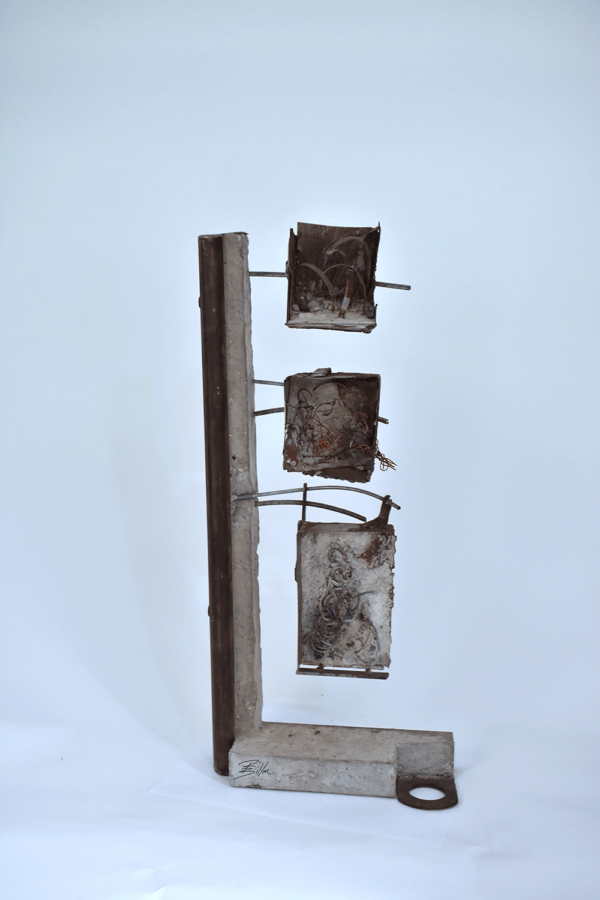 steel an concrete sculpture. main shaft holding three windoe-boxes containing different abstract metal media.