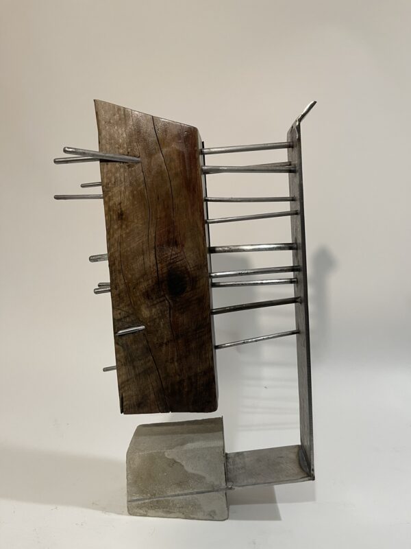 table-top sculpture: steel, concrete, and wood.