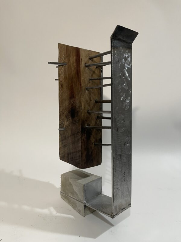 table-top sculpture: steel, concrete, and wood.