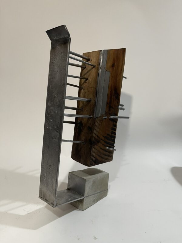 table-top sculpture: steel, concrete, and wood.